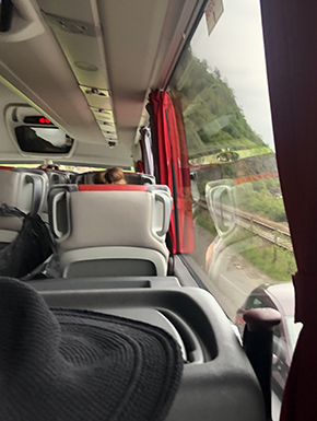 Bus interior with view and my hat