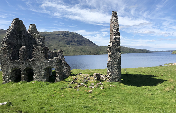 Photo of Scottish scenery from the bus, including a ruin