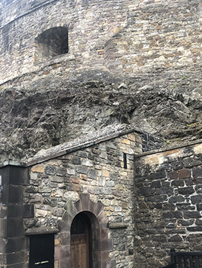 Standing stoneCatle wall with door and window