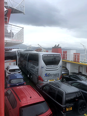 buses and other vehicles on ferry