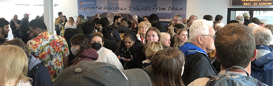 Crowd scene, lined up for ferry