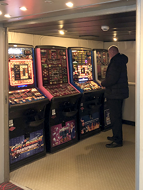 Man standing at electronic games