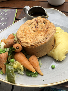 Plate of classic Scotish food including meat pie