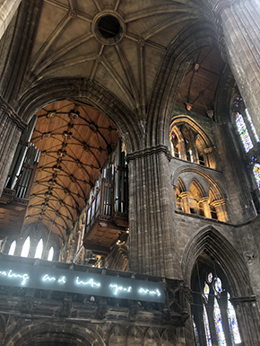 Glasgow cathedral nave with neon including ceiling beyond