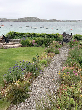 Pretty path to water with boats