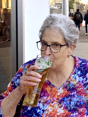 Susan drinking a pint