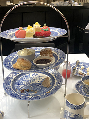 Tea delights in blue willow plate tower