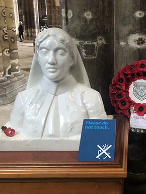 Bust of nurse with poppies