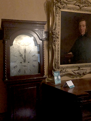 Clock and portrait