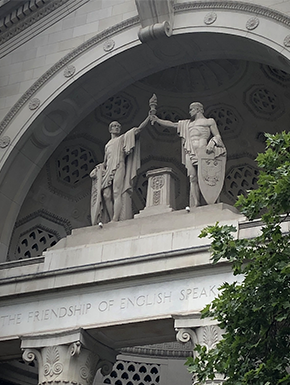 Sculpture over doorway above "The Friendshipof English Speakers"