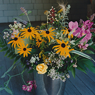 boquet including sweet pea and black eyed Susan