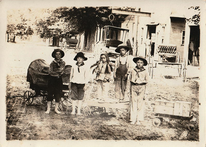 Very old photo of five boys playing 