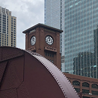 clock behind bridge