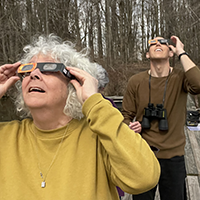 Ben and I looking through eclipse glasses