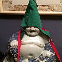 Buddha in elf hat