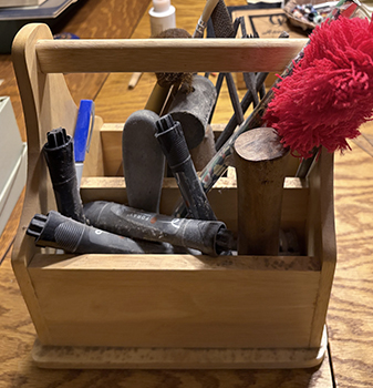 old supplies in shoe shine box